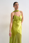 Front image of a model wearing the Annika ruffle maxi dress in green, by brand Top shop