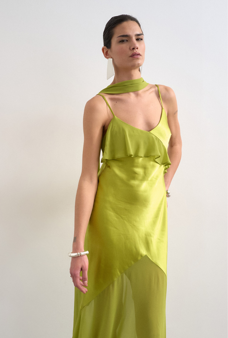 Front image of a model wearing Annika ruffle maxi dress in green, by brand Top shop