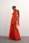 Front image of a model wearing Annika ruffle maxi dress in rust, by brand Top shop