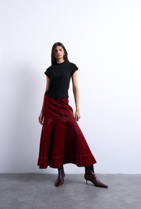 Front image of a model wearing Bea oneck fitted rib tee in black, by brand Top shop