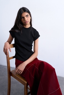 Front image of a model wearing the Bea oneck fitted rib tee in black, by brand Top shop