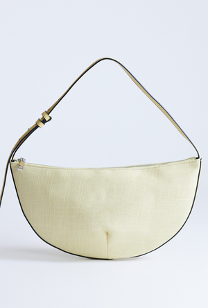 Front image  of the Curly canvas scoop shoulder bag in lemon, by brand Top shop
