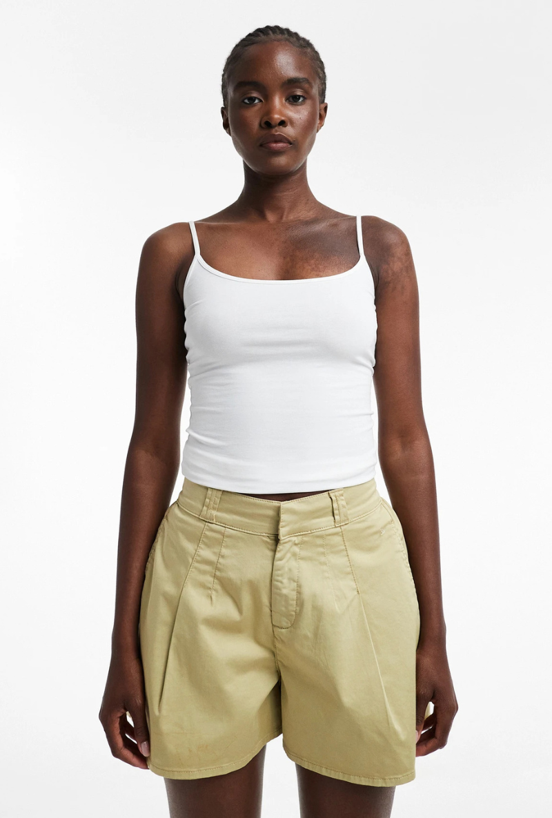 Front image of a model wearing Eva a line shorts in sage, by brand Top shop