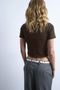 Back image of a model wearing the Everyday crop top in chocolate, by brand Top shop