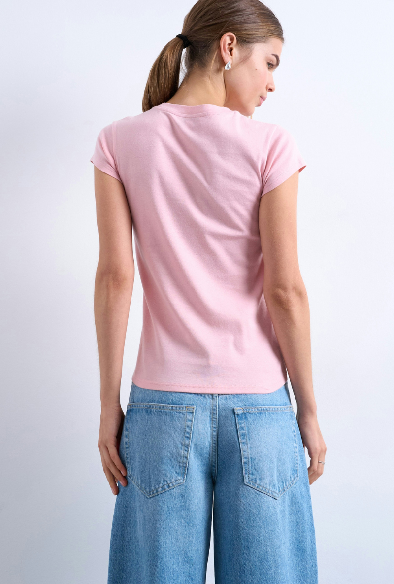 Back image of a model wearing Everyday top in pink, by brand Top shop