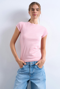 Front image of a model wearing the Everyday top in pink, by brand Top shop