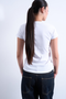 Back image of a model wearing the Everyday top in white, by brand Top shop