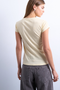Back image of a model wearing the Everyday top in yellow, by brand Top shop