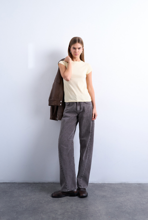 Front image of a model wearing the Everyday top in yellow, by brand Top shop