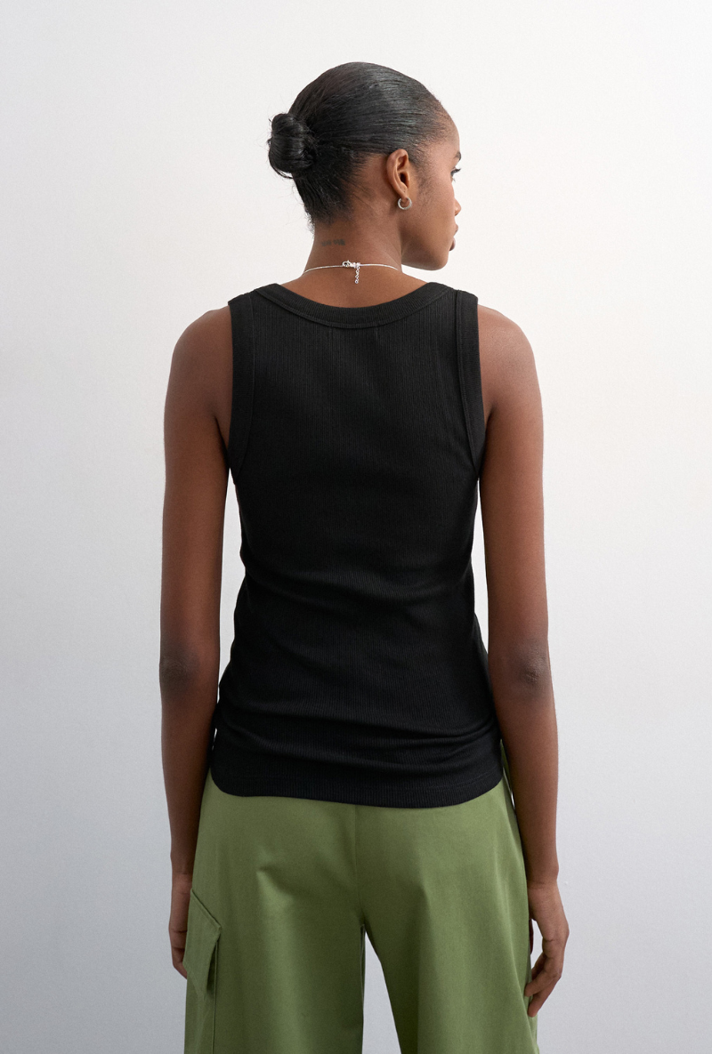 Back image of a model wearing Honey vest in black, by brand Top shop