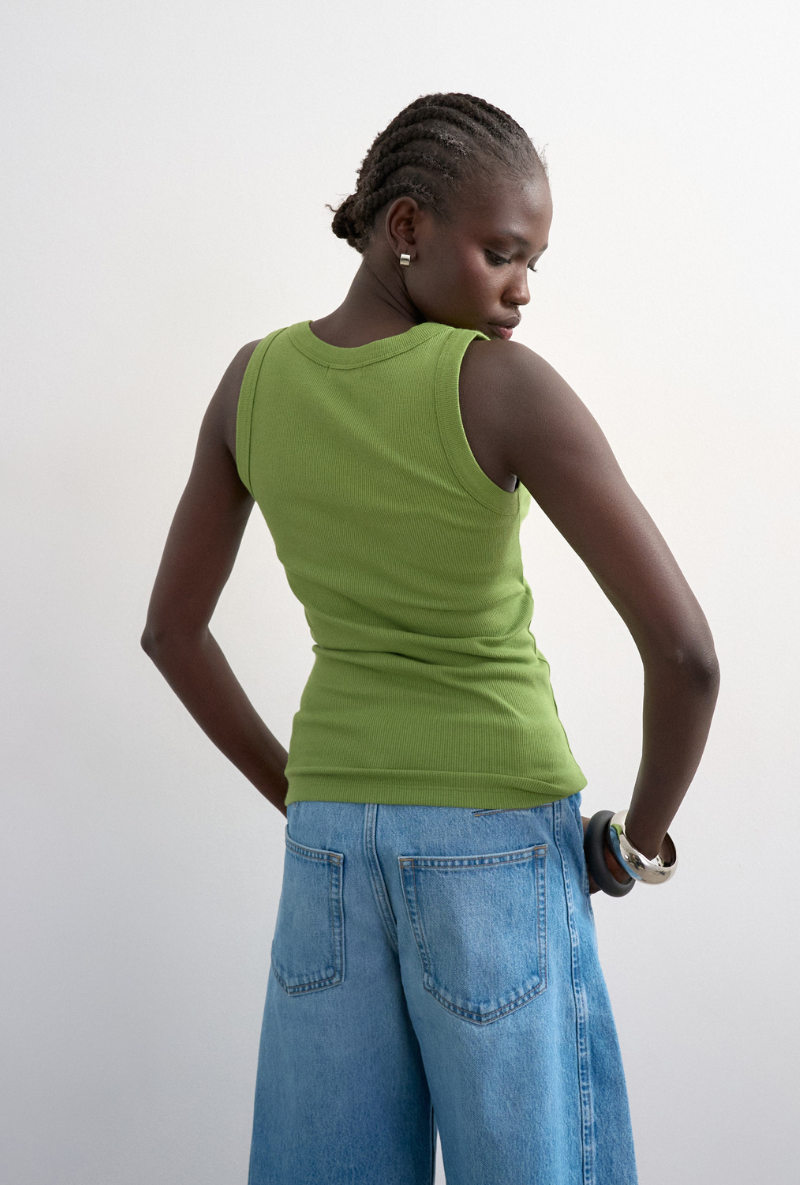 Back image of a model wearing Honey vest in green, by brand Top shop