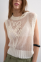 Front image of a model wearing the Josephine emb o in off white, by brand Top shop
