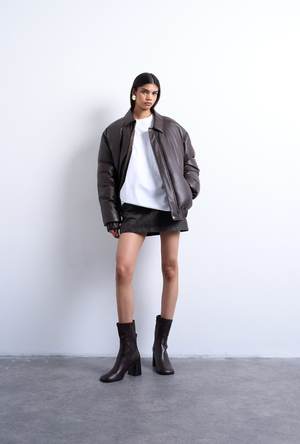 Front image of a model wearing the Ida oversize dropshoulder tee in white, by brand Top shop