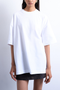 Front image of a model wearing the Ida oversize dropshoulder tee in white, by brand Top shop