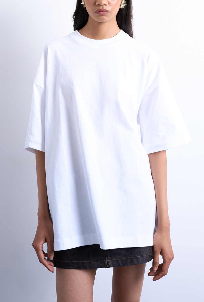 Front image of a model wearing Ida oversize dropshoulder tee in white, by brand Top shop