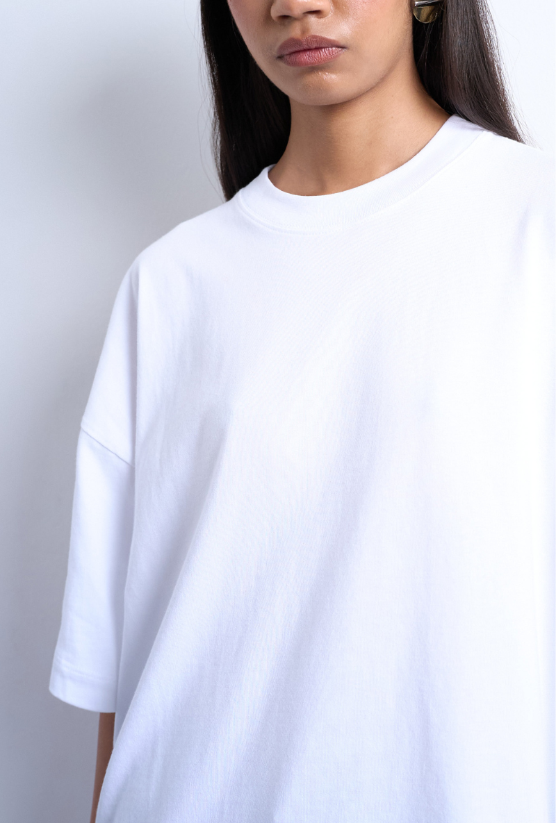 Front image of a model wearing Ida oversize dropshoulder tee in white, by brand Top shop