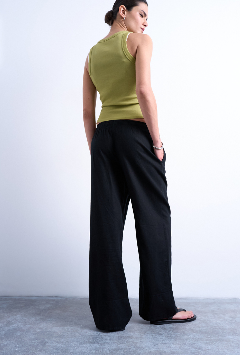 Back image of a model wearing Lakia straight trouser in black, by brand Top shop