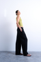 Front detail image of a model wearing Lakia straight trouser in black, by brand Top shop