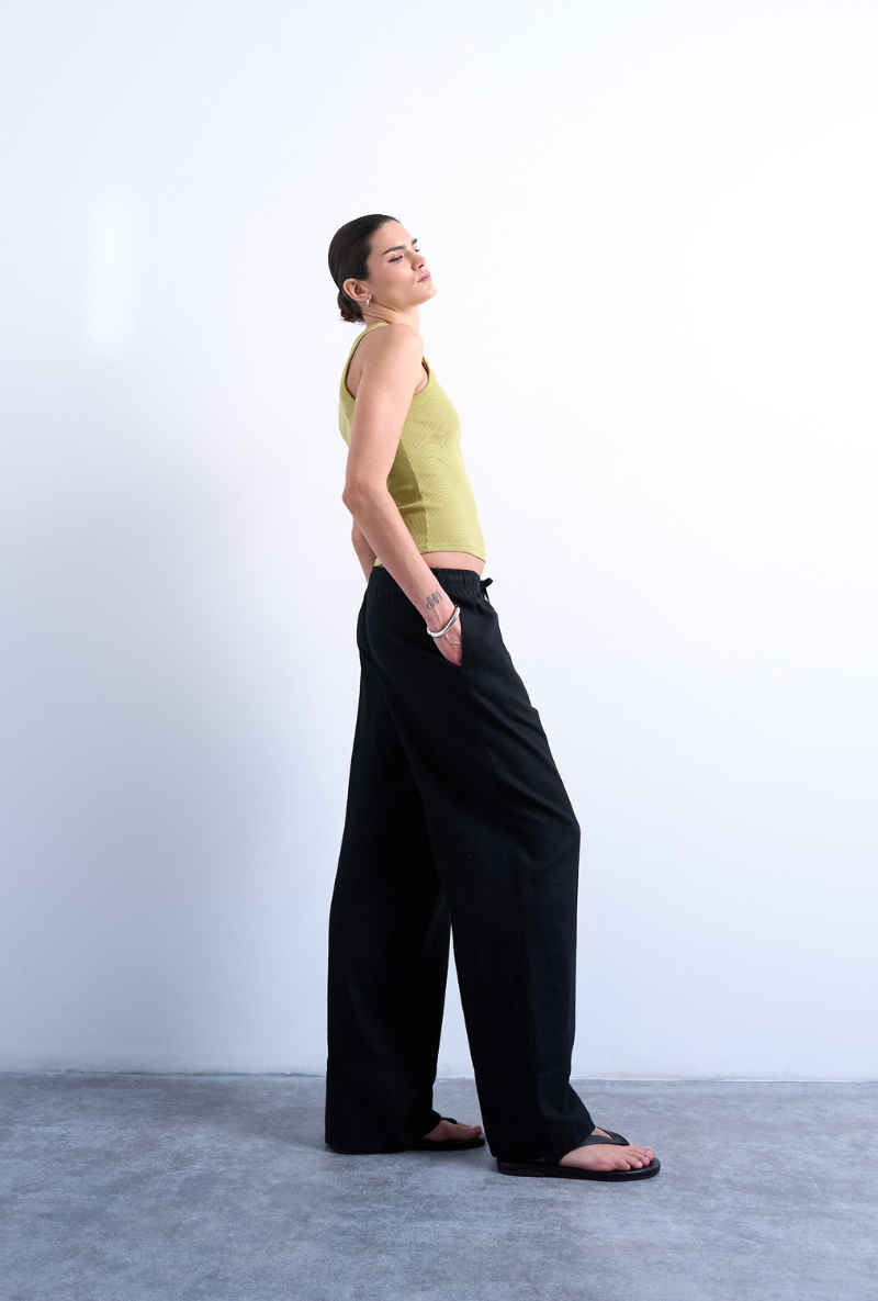 Front detail image of a model wearing Lakia straight trouser in black, by brand Top shop