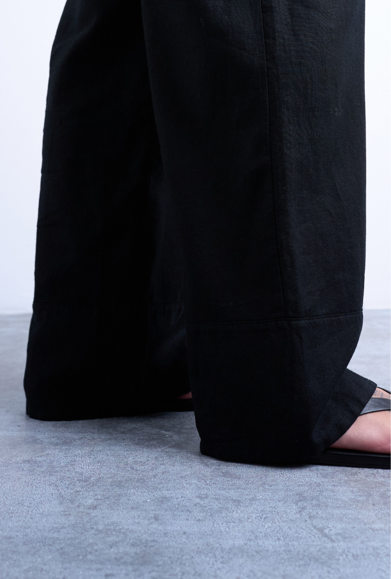 Front detail image of a model wearing Lakia straight trouser in black, by brand Top shop