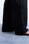 Front detail image of a model wearing the Lakia straight trouser in black, by brand Top shop