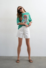 Image of VIGGA HIGH RISE WHITE DENIM SHORTS in white, by brand TOP SHOP