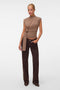 Front image of a model wearing Bari sl highneck top in brown, by brand Vero moda