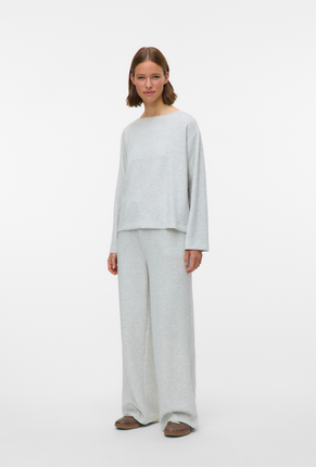 Front image of a model wearing Vero moda hali hw wide pants in light grey, by brand Vero moda