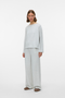 Front image of a model wearing Vero moda hali hw wide pants in light grey, by brand Vero moda