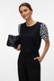 Front image of a model wearing the Jasy o neck top in black, by brand Vero moda