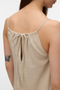 Back detail image of a model wearing the Jesmilo calf singlet dress in beige, by brand Vero moda