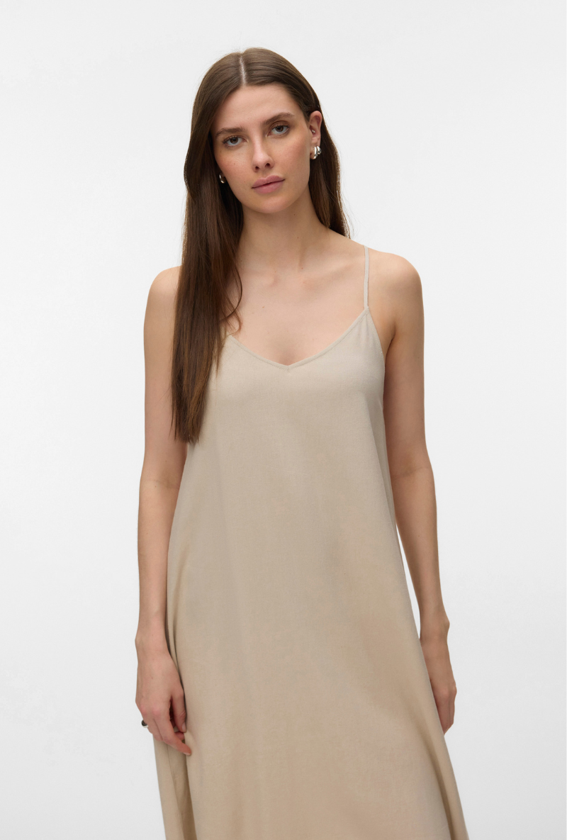 Front detail image of a model wearing Jesmilo calf singlet dress in beige, by brand Vero moda
