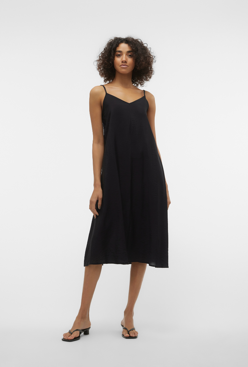 Front image of a model wearing Josie calf singlet dress in black, by brand Vero moda