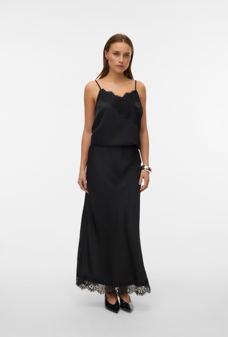 Front image of a model wearing Vero moda julia hw lace maxi skirt in black, by brand Vero moda