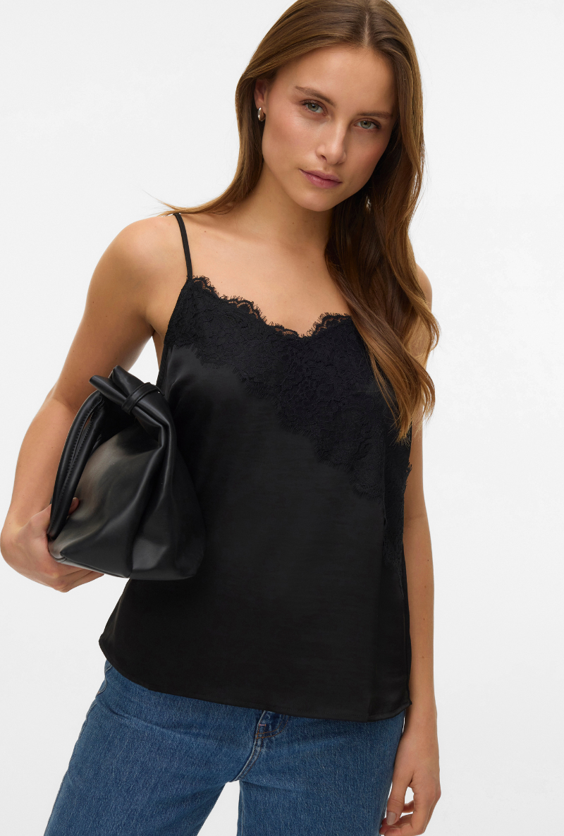 Front image of a model wearing Vero moda julie singlet lace top in black, by brand Vero moda