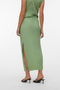 Back image of a model wearing the Malene ankle skirt in green, by brand Vero moda