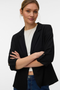 Front image of a model wearing the Milo loose blazer in black, by brand Vero moda