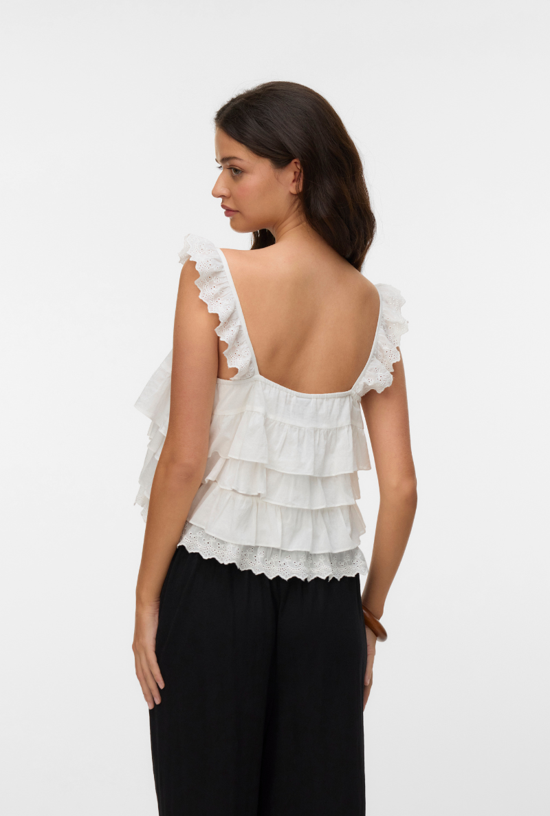 Back image of a model wearing Sandy layered top in white, by brand Vero moda
