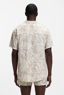 Back image of a model wearing the Beach shirt in beige, by brand Boss