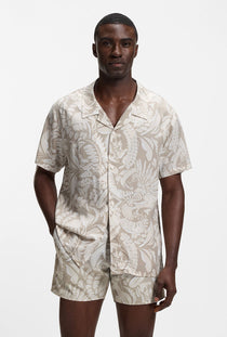 Front image of a model wearing the Beach shirt in beige, by brand Boss