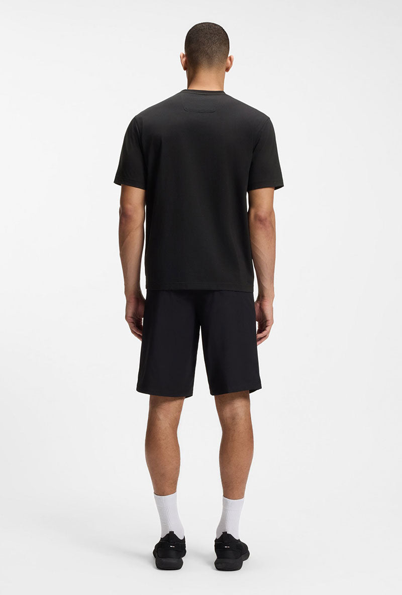 Back image of a model wearing Globe logo tshirt in black, by brand Boss