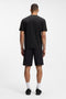 Back image of a model wearing the Globe logo tshirt in black, by brand Boss
