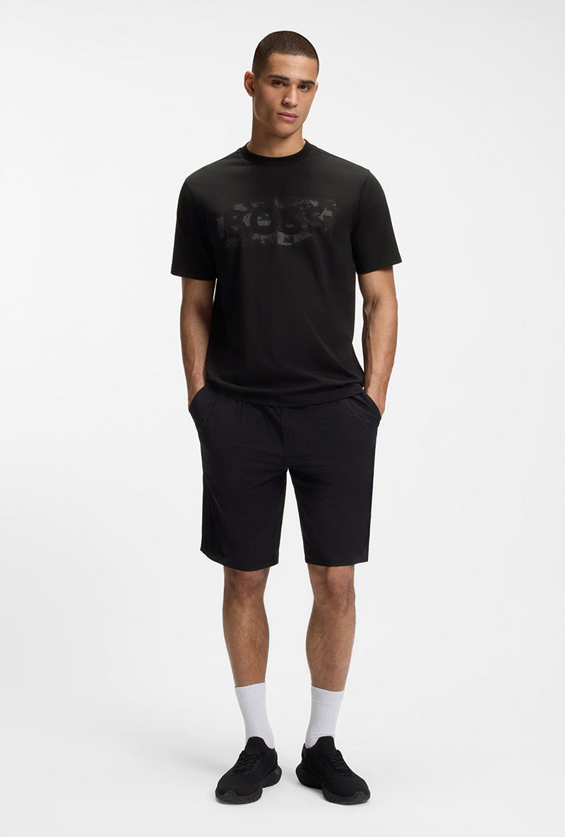 Front image of a model wearing Globe logo tshirt in black, by brand Boss