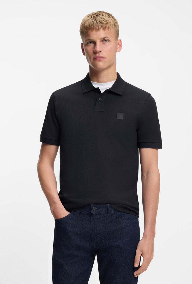 Front image of a model wearing Passenger polo in navy, by brand Boss