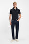 Front image of a model wearing the Passenger polo in navy, by brand Boss