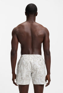 Back image of a model wearing the Piranha swimshorts in beige, by brand Boss