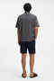 Back image of a model wearing the Rash 2 aop ss shirt in navy, by brand Boss