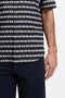 Front detail image of a model wearing the Rash 2 aop ss shirt in navy, by brand Boss