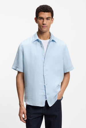 Front image of a model wearing the Rash 2 ss shirt in light blue, by brand Boss