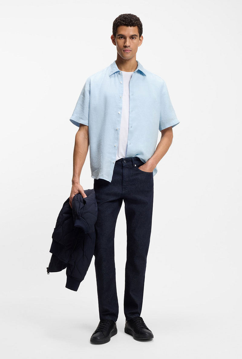 Front image of a model wearing Rash 2 ss shirt in light blue, by brand Boss